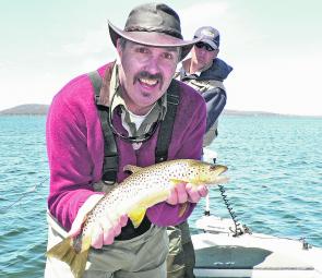 Fabulous Phill Jones with a dry fly caught brown trout from the deep water in Great Lake.