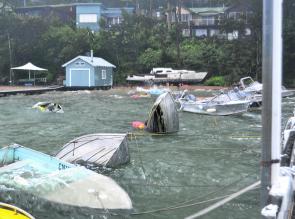 Carnage. This scenario was common along Pittwater, with more boats sunk than floating at many of the tie-up areas.