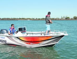 A couple of lads from Sea Jay boats enjoying some Burnett River fishing. 