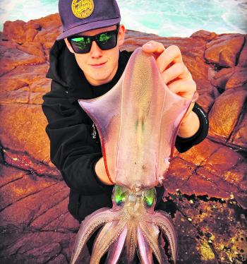 Jack Hammond displays a quality squid taken from the rocks.
