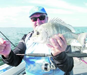 Bill McGuire with a stonker bream caught while fishing with the author at the end of the third runway.