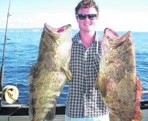 Alex from Gympie with two excellent gold spot cod caught at Rainbow Beach.