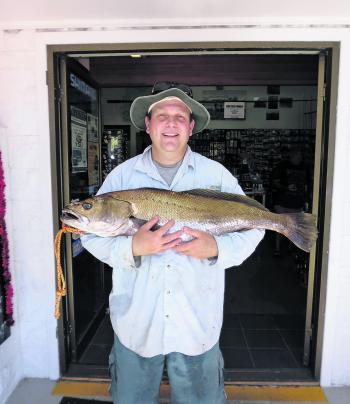 A decent size mulloway puts a happy smile on the face of this local angler.