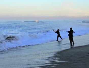 When casting into the surf, always find the gutter and concentrate your efforts there. That’s where the fish will be holding.