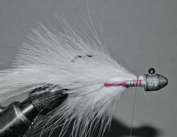 Next, do the same on top of the hook shank to secure a similar amount of marabou quills. 