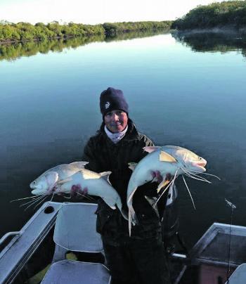 Chilly weather in Mackay did not stop Clinton Hassan scoring these two threadies on live prawns worked along the sloping bank in the background.
