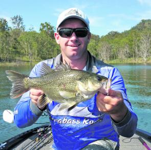 This average sized bass came from the weed edges of Maroon Dam. Check out the southern banks concentrating on features like points and bays.