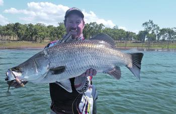 Awoonga Dam produced several nice barramundi for the author on a recent visit. This 91cm fish came from a weed edge and ate a jighead rigged with a Willie soft plastic.