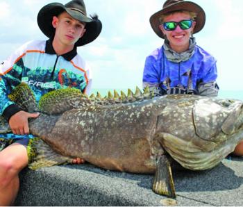 The author and his mate Axel with a 100lb+ groper caught on a soft vibe.