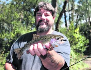A small rainbow trout caught on a Strike Tiger nymph soft plastic in a Kiewa River tributary in autumn last year.