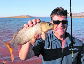 Brett Corker loves his fishing, and he is good at it too! Here is he with a Lake Hume carp caught on a 40mm Metalhead soft plastic while targeting redfin recently. The redfin and carp should both be quite active in Lake Hume during April. 