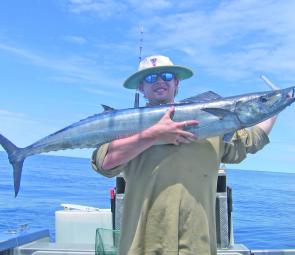 Conor Lynch and a 12kg wahoo onboard Triton IV with SQCS.