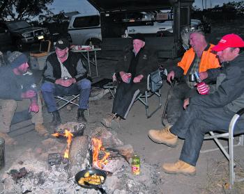The warmth of a winter campfire and good mates provides one of cod fishing’s best memories. 