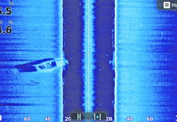 A typical Side Scan image showing the left and right hand side of our boat. In this image we can see a boat wreck on the left hand side.