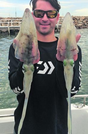 Jules Frank with a couple of mid-size calamari taken at Blairgowrie.